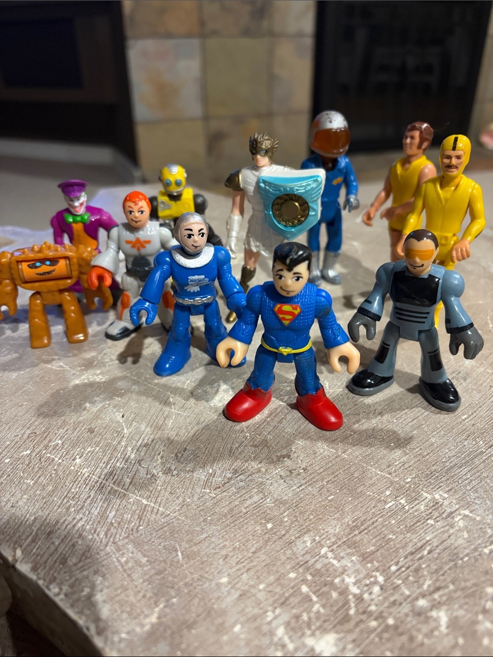 DC Comics 11 Mini Figures Pack with Blue Superman and Yellow Characters. 4”